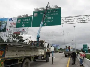 Overhead and overhang sign at Motorway Department of Highway