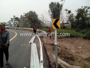 Road sign and guardrail at Baan Rong Kum Amphoe Muang Phayao