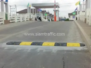 Rubber speed bump and manual barrier at Warasiri Village
